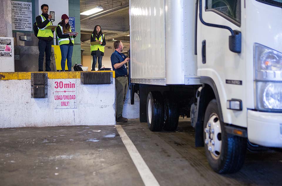 photo of data collectors in the loading bay