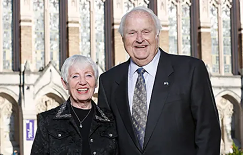 Allan Osberg posing with his wife