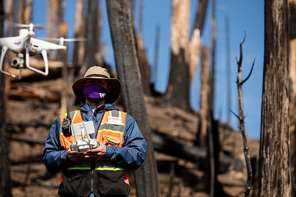 A research flying a drone