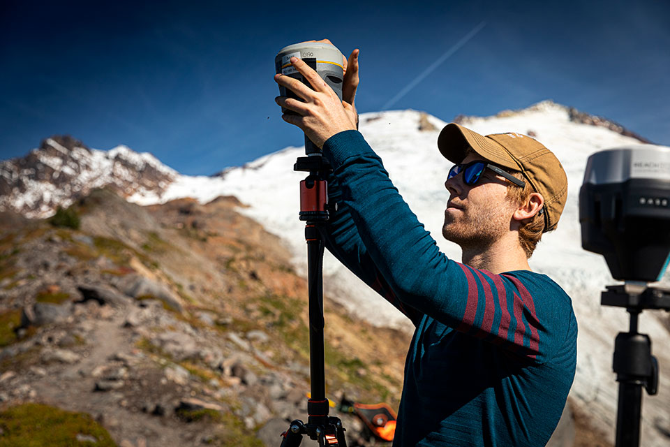 Ph.D. student Danny Hogan sets up a Global Navigation Satellite System receiver